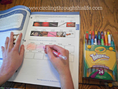 Supergirl completes a page in the activity book of this wonderful homeschool music curriculum #hsreviews Circling Through This Life