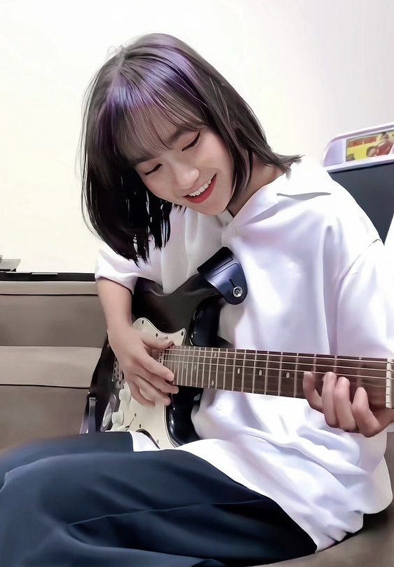 foto freya jkt48 bermain gitar