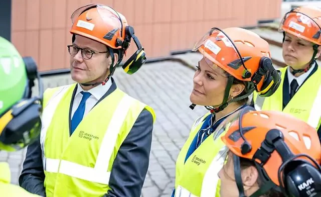 Crown Princess Victoria wore a Miller bluebell double breasted dickey jacket by Veronica Beard, and vertical striped bow blouse by Gant