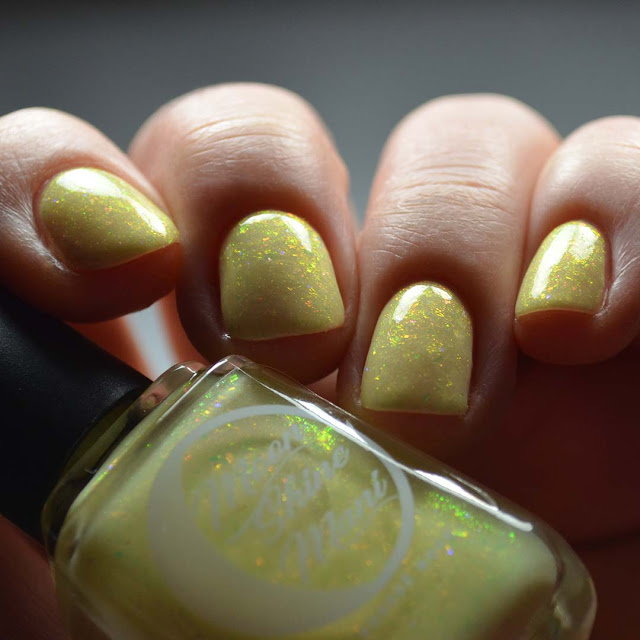 yellow nail polish with pink to green shimmer swatch