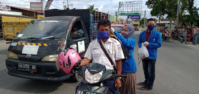 Peduli Pencegahan COVID-19, PMII Padang Pariaman Bagikan Ribuan Masker 