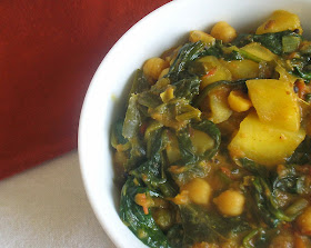 chickpea mango curry with spinach in a tomato coconut gravy