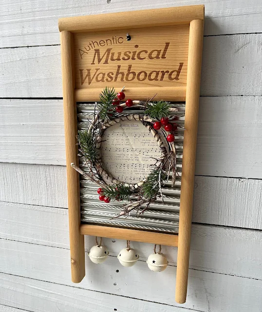Photo of a washboard being decorated for Christmas.
