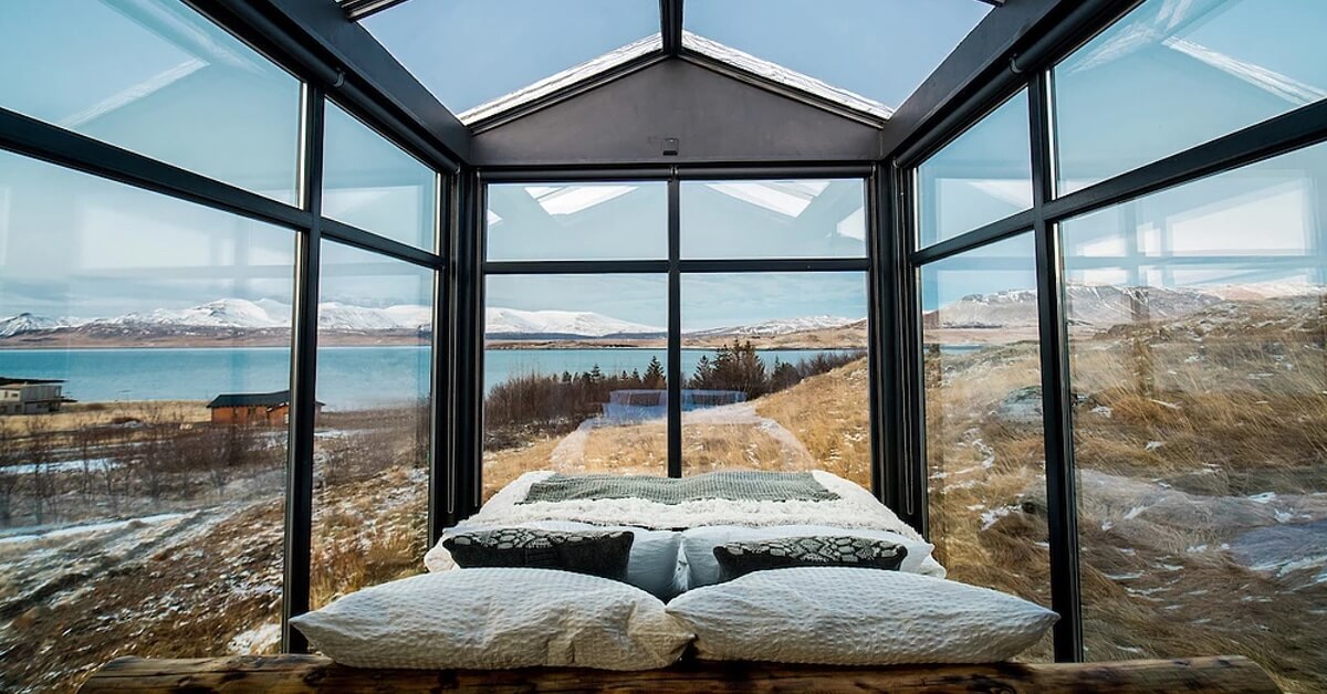 Cabin With Glass Walls In Iceland Lets Visitors Gaze At The Northern Lights While Lyiing In Their Bed