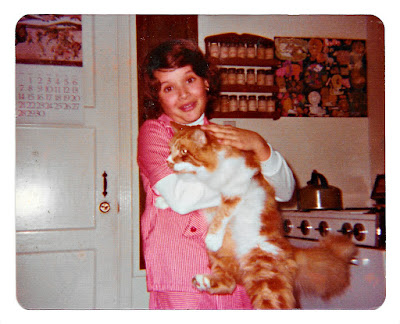 Milan Mejia-Prieto and Amber the Cat in Broadmoor, California in the late 1970s