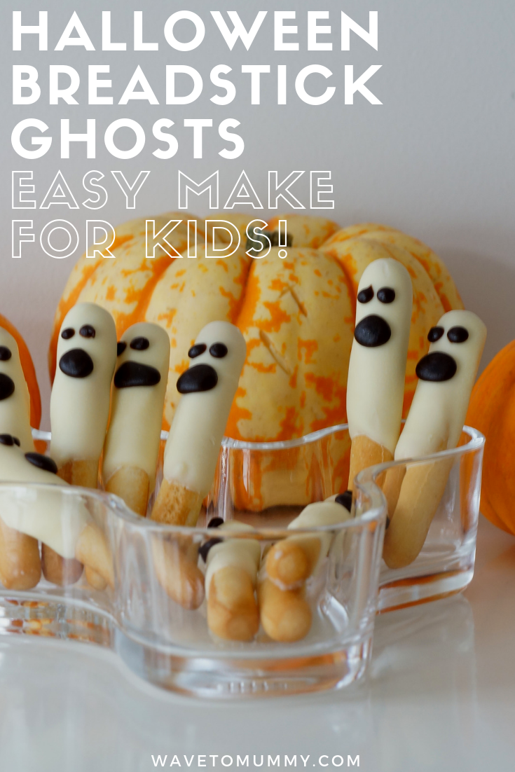 A very simple and quick recipe to do for a Halloween party - ghost breadsticks! All you need is breadsticks, white chocolate, dark chocolate and a piping bag. Kids love these, and easy for kids to make too.