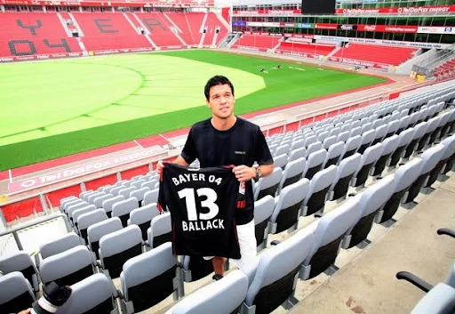 New Bayer Leverkusen player Michael Ballack poses with his new jersey