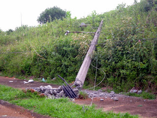 downed telephone pole, La Ceiba, Honduras