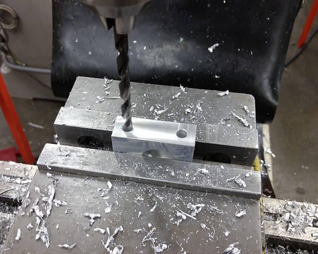 drilling bolt holes in aluminum block