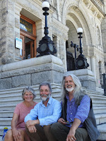 (ltr) Nancy, Mark, and John on the steps of the Parliament Building, Victoria BC.