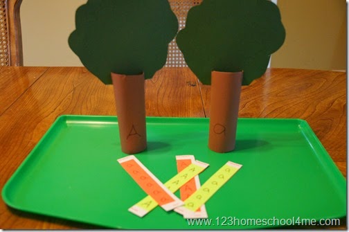 write a capital A on one tree and a lowercase a on the other trunk