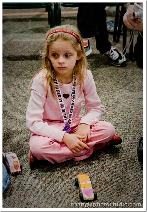 Pinewood Derby - Sophia taking a break.