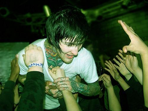 but to give my first "tip of the hat" to the tattoos of Mitch Lucker.