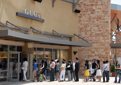 Outlet Premium on Tourists Are Standing In Front Of Gucci Shop  At Yeoju Premium Outlets
