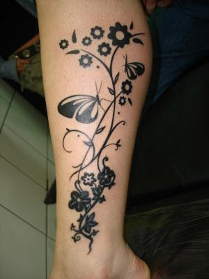 Phoenix Bird With Orchid Flower Tattoo. The meanings of orchids are very