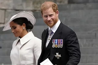 Prince Harry and his wife Meghan Markle