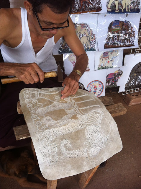 Making pictures out of buffalo skin, Kanchanaburi, Thailand 