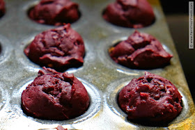 photo of muffin pan with cocoa beet chocolate chip muffins