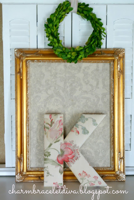 ornate vintage gilded thrift store frame and Anthropologie floral monogram letter K