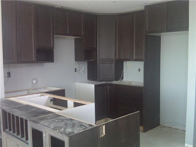 painting kitchen cabinets white. It#39;s been painted and the