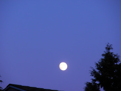 photo of the full moon over Rockaway Beach