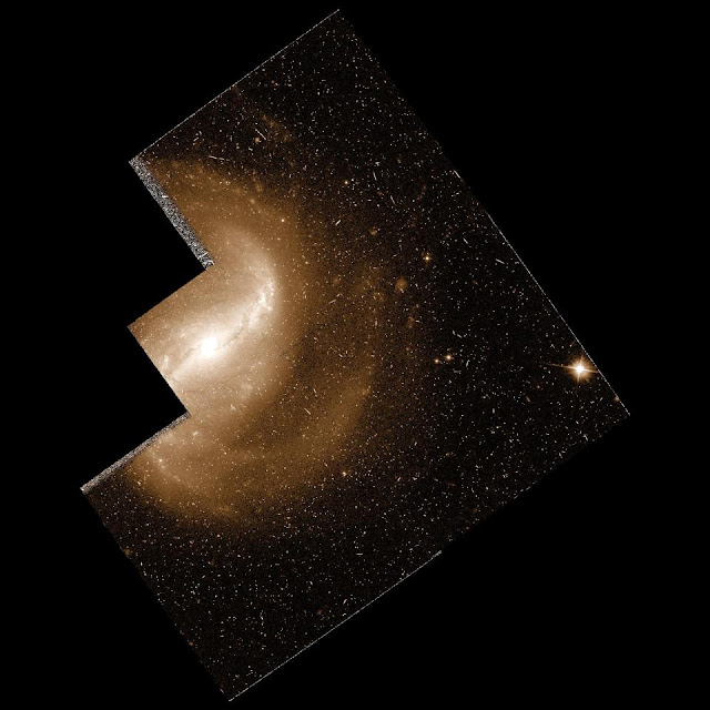 galaksi-ngc-2718-kembaran-galaksi-bima-sakti-astronomi