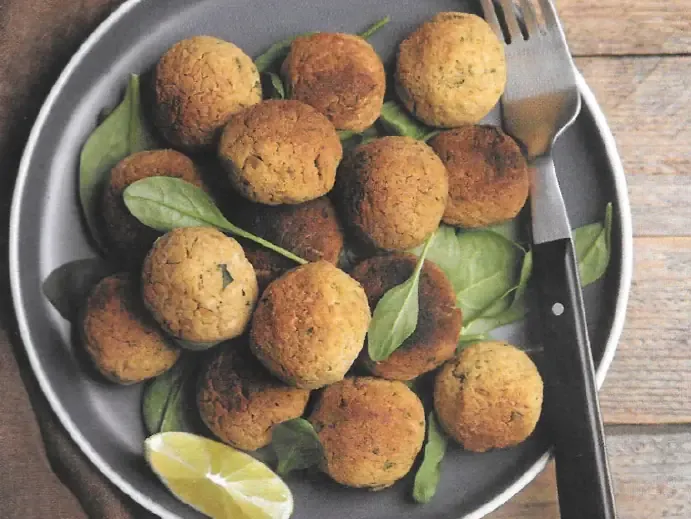 Polpette con spinaci, curry e limone