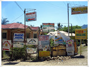 The narrow road leading to the entrance of Kabayan Beach Resort in Laiya in . (img )