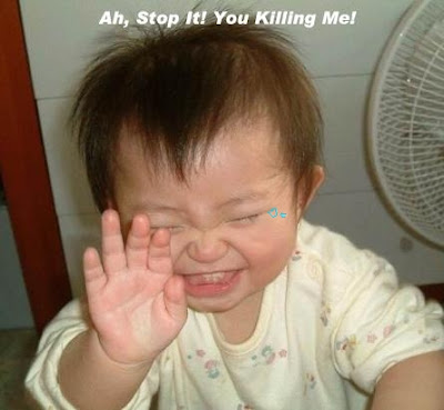 Funny Pictures: A Can't Stop Laughing Baby