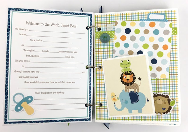 Baby Boy Scrapbook Journal Album with a journaling page, pacifier, and cute animals like an elephant, lion, frog, and hedgehog