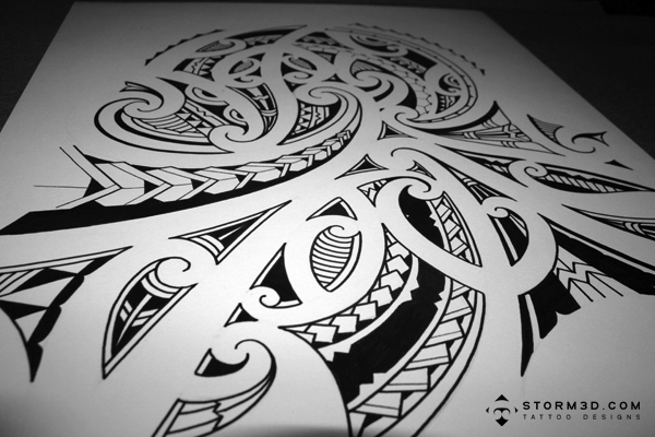 The completed design with flowing maori koru curves