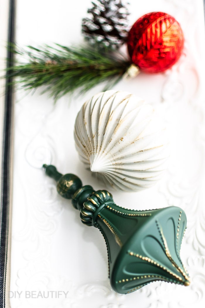 green and white ornaments with gold