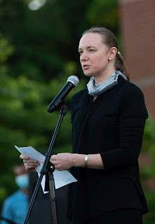 Emily speaking at a vigil and call to action on June 13, 2020. Photo by Alex Sakes.