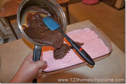 Spoon on the decadent fudgy ice cream topping
