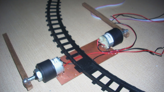 Automatic Railway Gate Control System Using AVR ATmega8  with complete project report, code and circuit diagram.