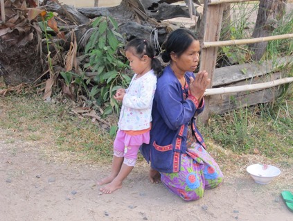 greet the monks through a "WAI"