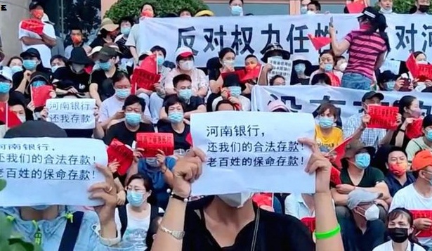 Workers protest, clash outside the world's largest iPhone factory in China