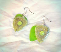 Glittery guitar pick earrings with yellow gems and green transparent picks