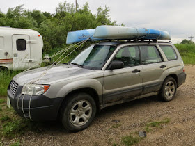 kayaks on car