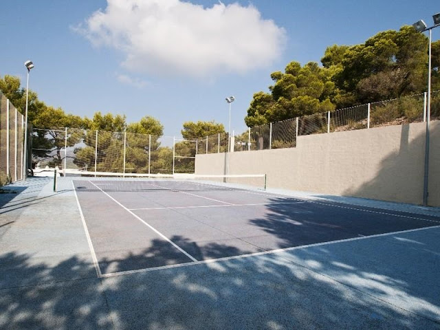 Tennis court in the backyard