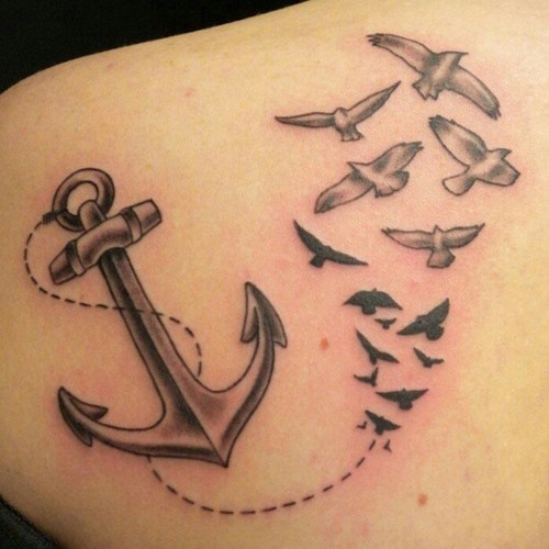 Black grey anchor with birds tattoo
