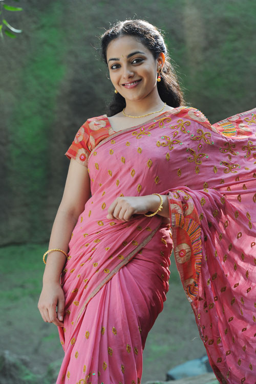 Nitya Menon Latest Cute Stills Nitya Menon New Spicy Images In Saree Photoshoot images