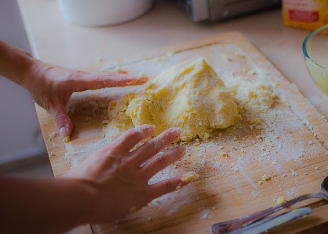 Two hands forming a dough, cooking and baking