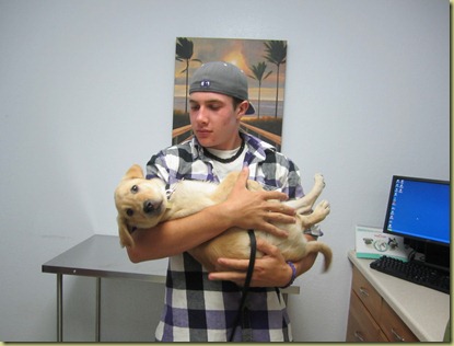 Tyler holding Vienna right before her shots.