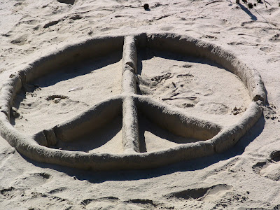 Foto Simbolo de la Paz en la arena