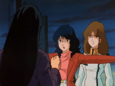 Minmay defends Misa from Kaifun's anger.