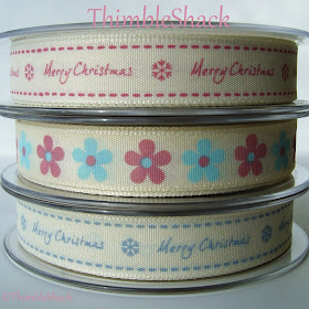 Pinks and blue Berisford grosgrain Christmas ribbon, blue pick Daisy ribbon.