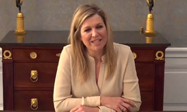 Queen Maxima wore a beige semi sheer silk blouse collarless hidden button long sleeve