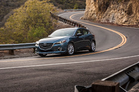 Front 3/4 view of 2016 Mazda 3 S Five-Door Grand Touring