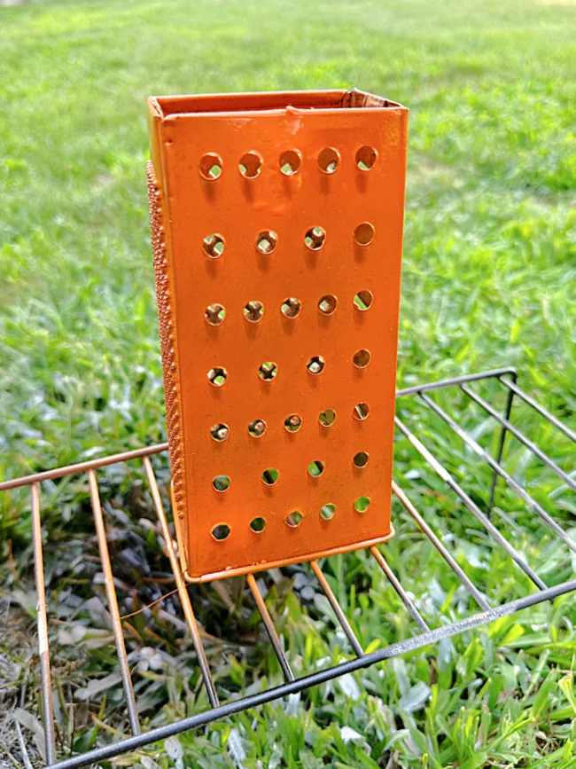 orange painted cheese grater